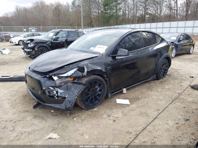 2023 TESLA MODEL Y 7SAYGDEE8PA110476 Photo 1