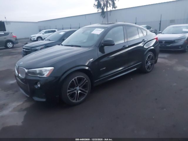 2015 BMW X4 5UXXW3C57F0M89428 Photo 1