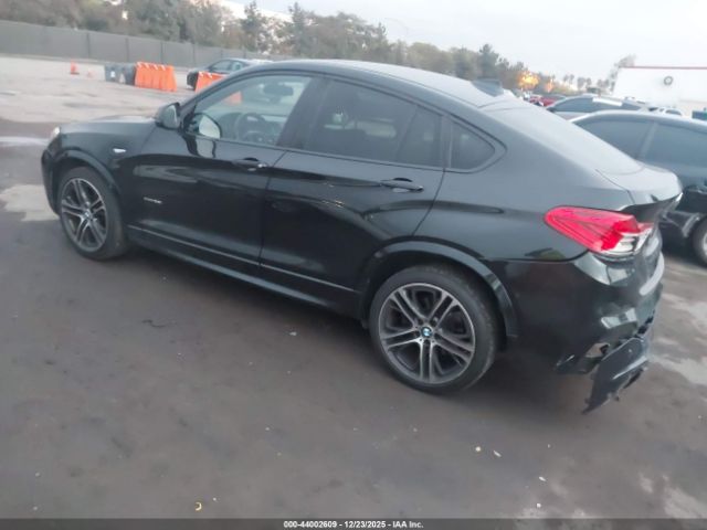 2015 BMW X4 5UXXW3C57F0M89428 Photo 2