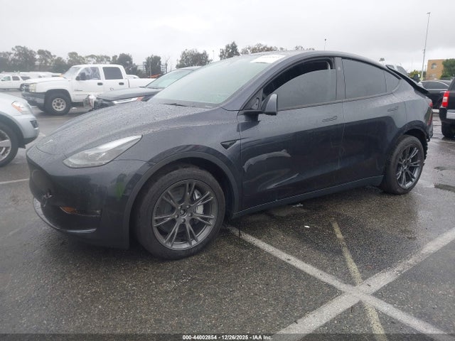 2024 TESLA MODEL Y 7SAYGAEE1RF127902 Photo 1