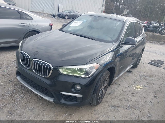 2016 BMW X1 WBXHT3Z39G4A51238 Photo 1
