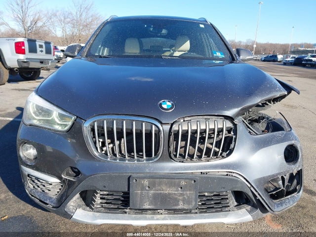 2016 BMW X1 WBXHT3C3XGP889721 Photo 5