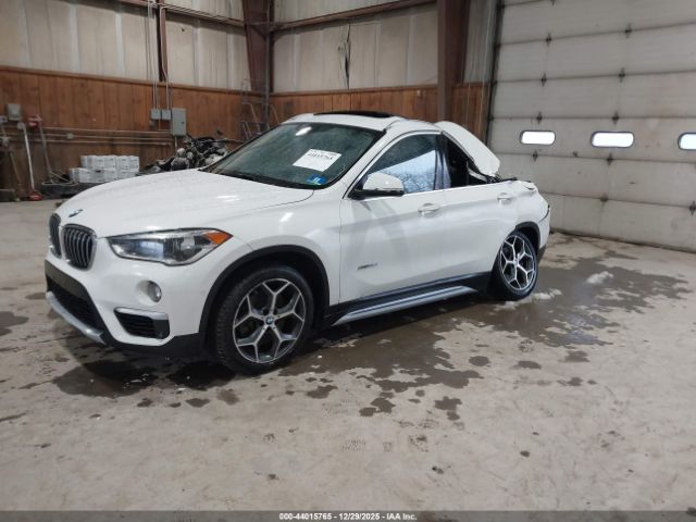 2016 BMW X1 WBXHT3Z31G4A51802 Photo 1