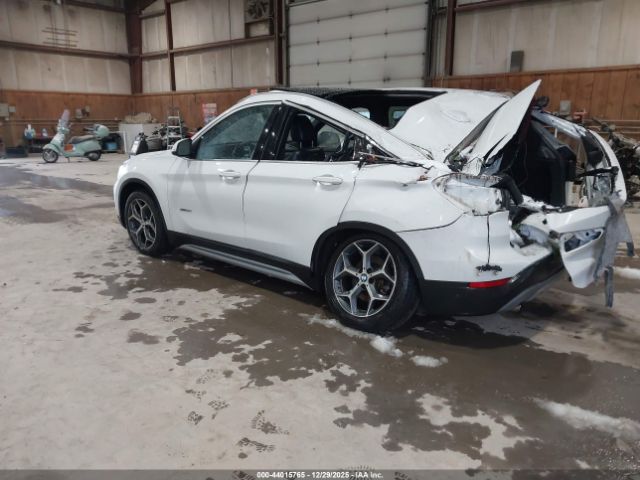 2016 BMW X1 WBXHT3Z31G4A51802 Photo 2