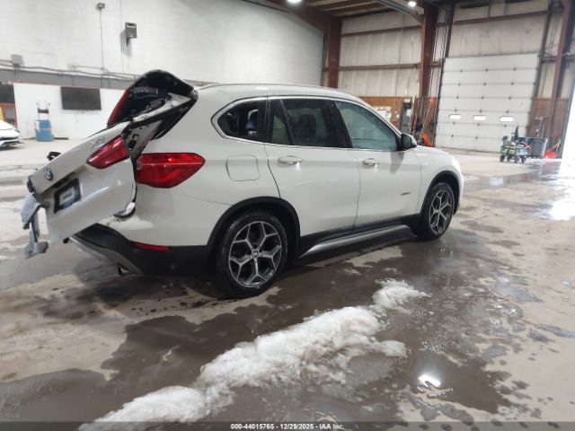 2016 BMW X1 WBXHT3Z31G4A51802 Photo 3
