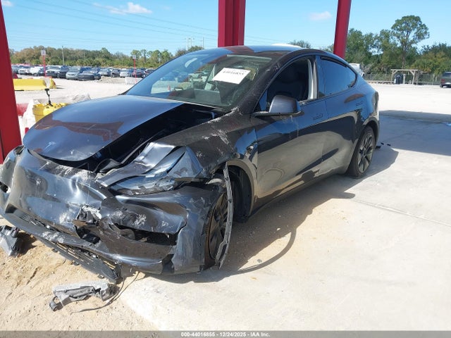 2025 TESLA MODEL Y 7SAYGDED2SF300017 Photo 1