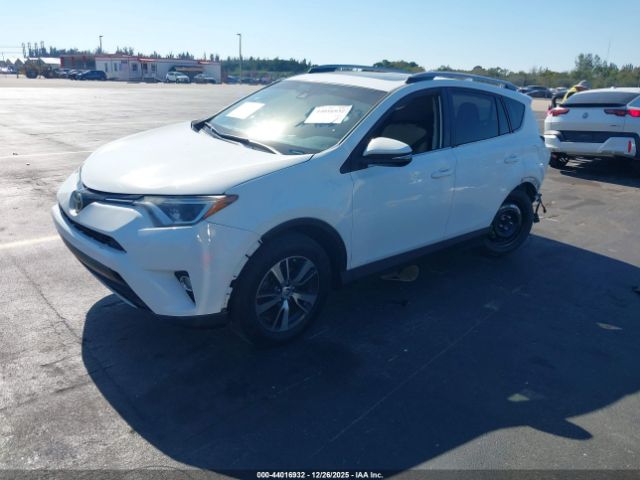 2018 TOYOTA RAV4 JTMRFREV9JJ256826 Photo 1