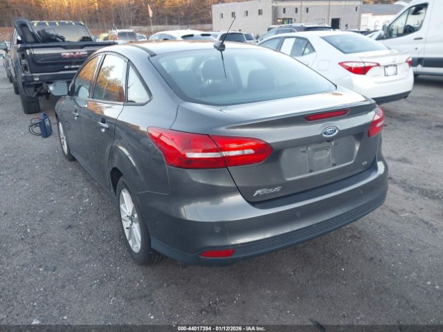 2015 FORD FOCUS 1FADP3F29FL377950 Photo 2