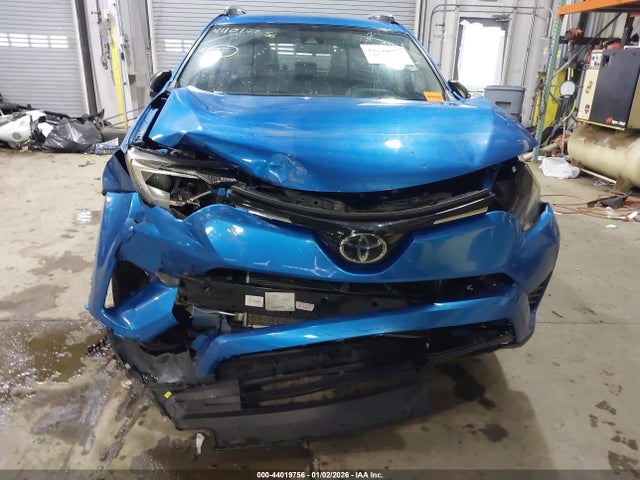 JTMZFREV5JJ183051 Toyota RAV4 LE