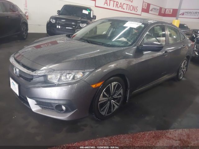 2018 HONDA CIVIC JHMFC1F77JX019048 Photo 1