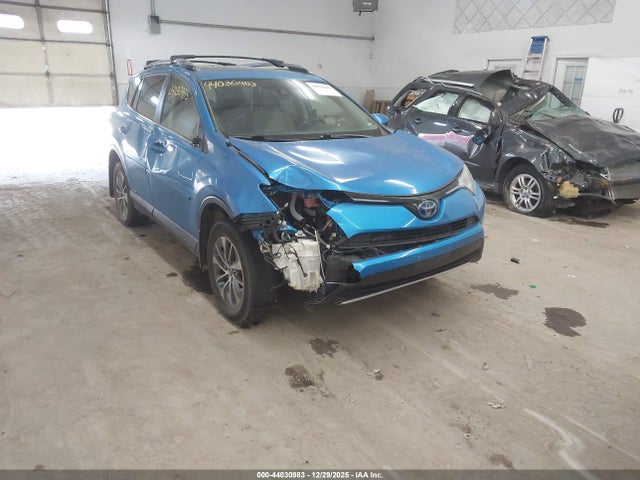 JTMRJREV9JD240560 Toyota Rav4 Hybrid Xle