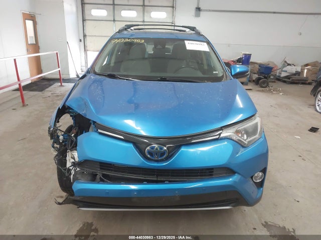 JTMRJREV9JD240560 Toyota Rav4 Hybrid Xle