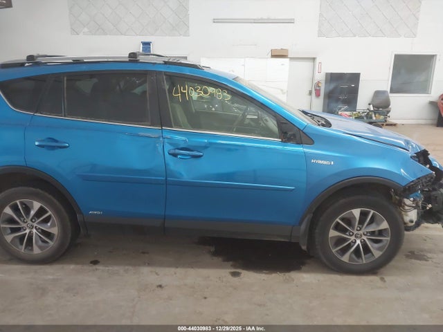 JTMRJREV9JD240560 Toyota Rav4 Hybrid Xle