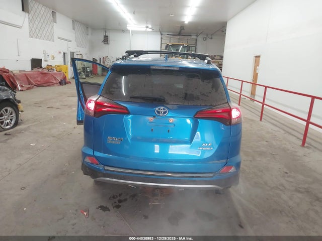 JTMRJREV9JD240560 Toyota Rav4 Hybrid Xle