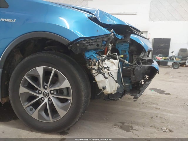 JTMRJREV9JD240560 Toyota Rav4 Hybrid Xle