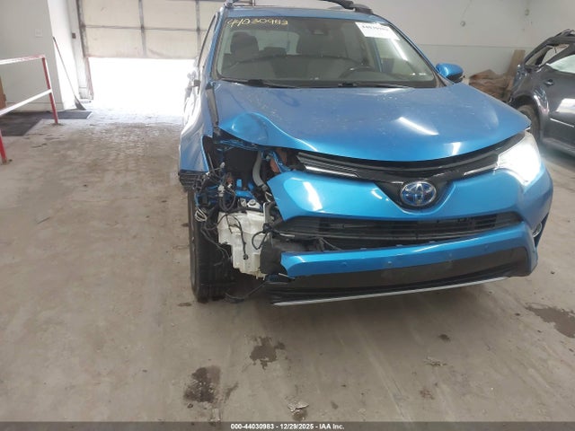 JTMRJREV9JD240560 Toyota Rav4 Hybrid Xle