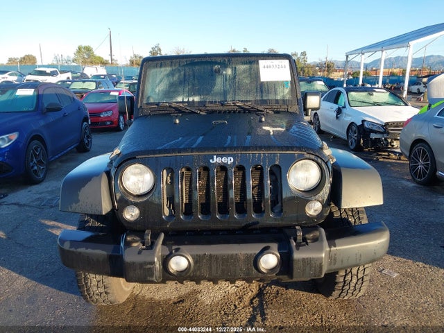 1C4BJWDG8EL140867 Jeep Wrangler Unlimited Sport