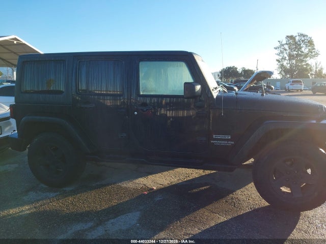 1C4BJWDG8EL140867 Jeep Wrangler Unlimited Sport