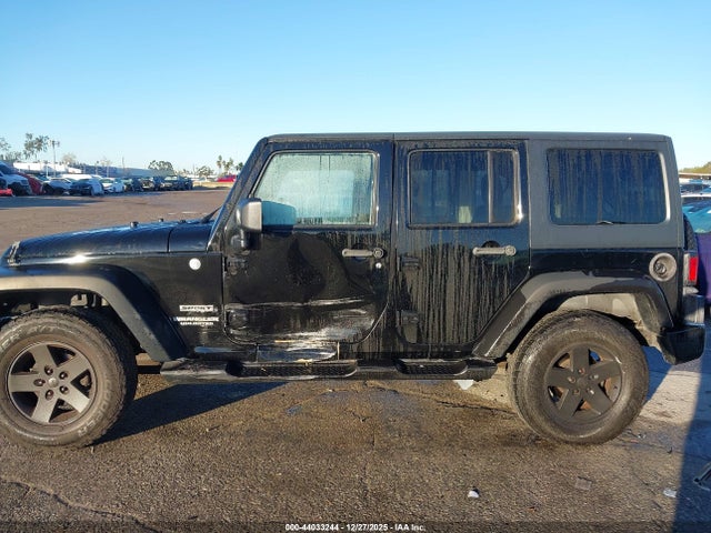 1C4BJWDG8EL140867 Jeep Wrangler Unlimited Sport