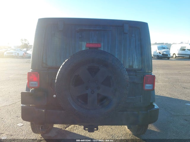 1C4BJWDG8EL140867 Jeep Wrangler Unlimited Sport