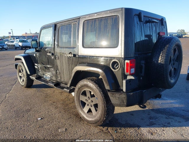 1C4BJWDG8EL140867 Jeep Wrangler Unlimited Sport