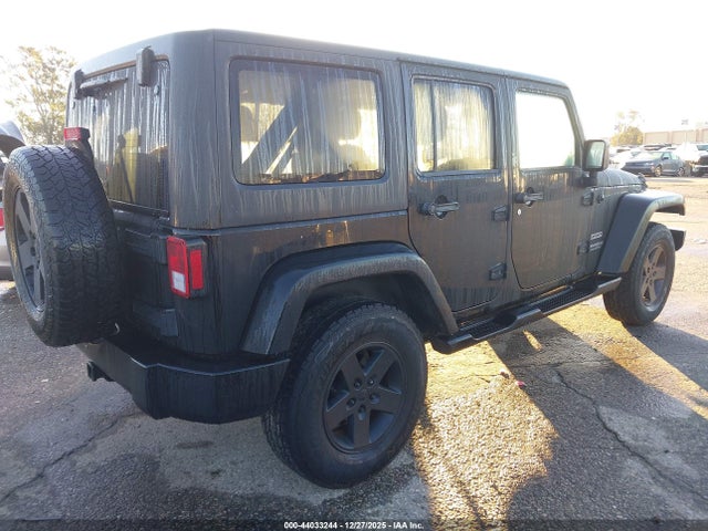 1C4BJWDG8EL140867 Jeep Wrangler Unlimited Sport