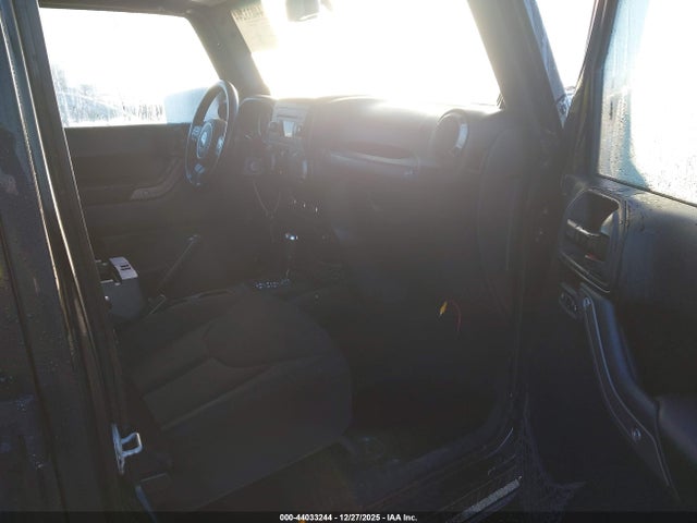 1C4BJWDG8EL140867 Jeep Wrangler Unlimited Sport