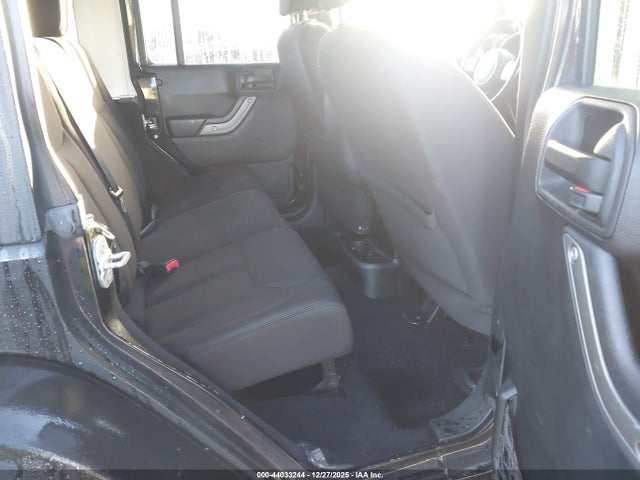 1C4BJWDG8EL140867 Jeep Wrangler Unlimited Sport