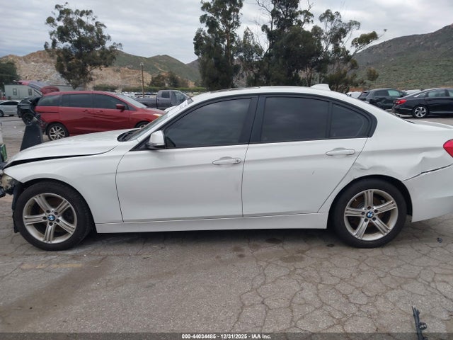 WBA3C1C5XEK114193 BMW 328I