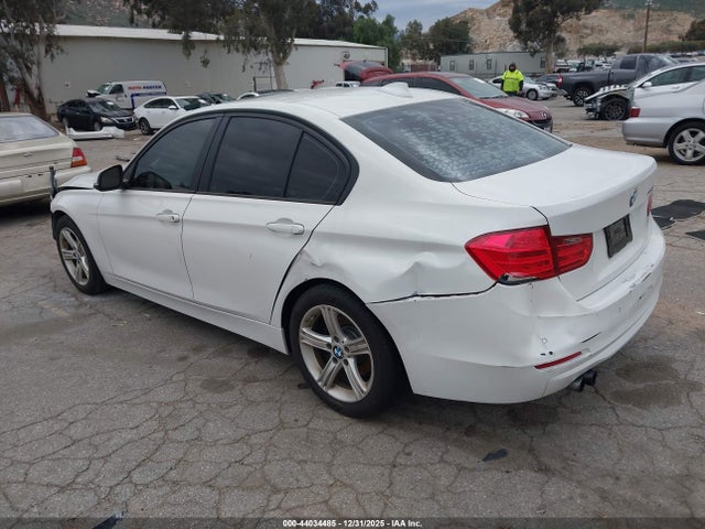 WBA3C1C5XEK114193 BMW 328I