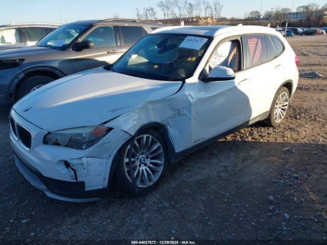 2015 BMW X1 WBAVM1C58FVW56866 Photo 1