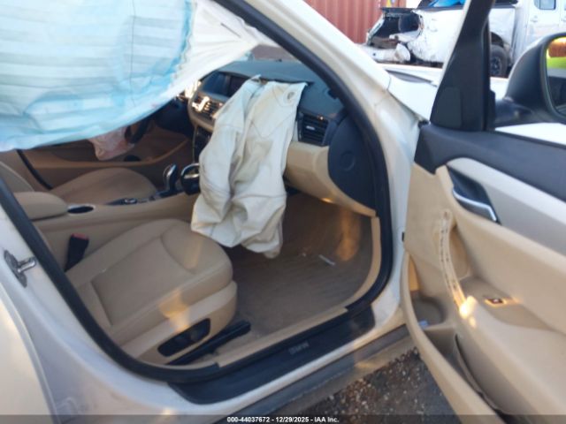 2015 BMW X1 WBAVM1C58FVW56866 Photo 4