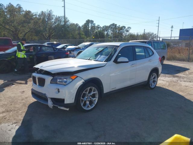 2013 BMW X1 WBAVL1C54DVR85967 Photo 1