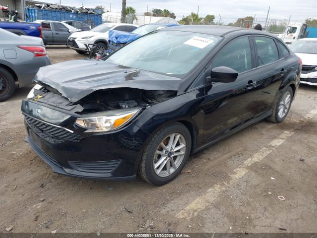 2018 FORD FOCUS 1FADP3FE9JL312857 Photo 1
