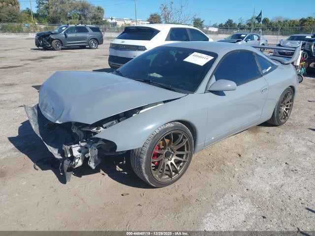 1999 MITSUBISHI ECLIPSE 4A3AK34YXXE033386 Photo 1