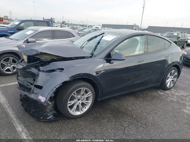 2024 TESLA MODEL Y 7SAYGDED4RF072080 Photo 1