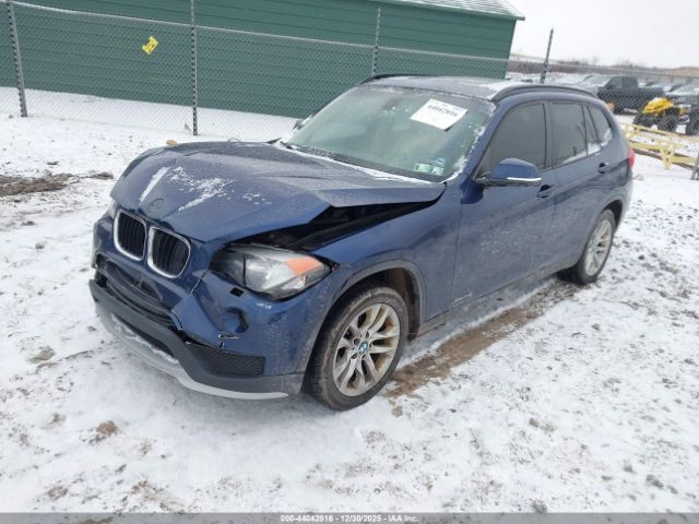 2015 BMW X1 WBAVL1C55FVY30413 Photo 1