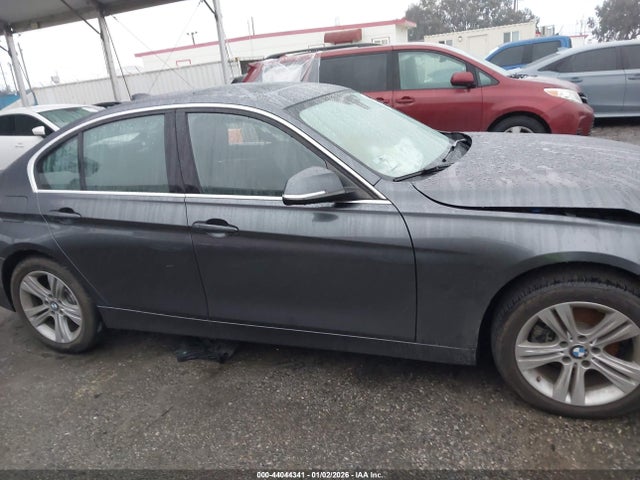 WBA8B9C56JEE81143 BMW 330I