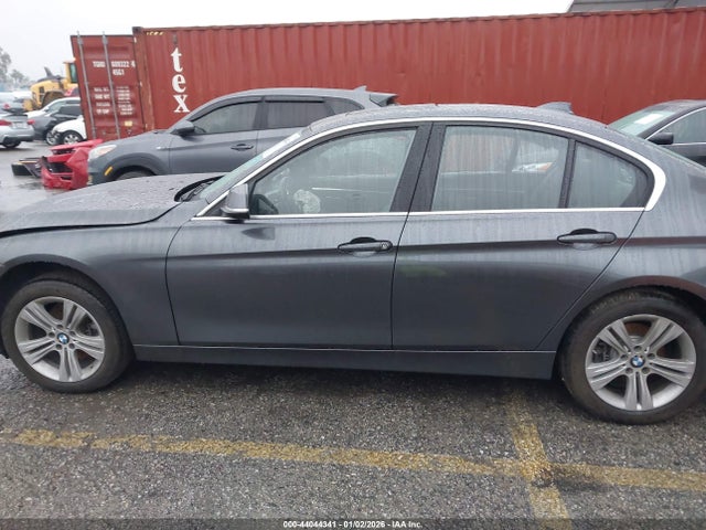 WBA8B9C56JEE81143 BMW 330I