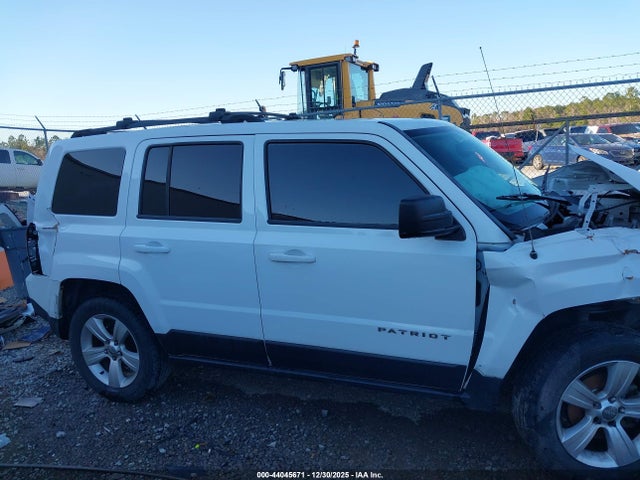 1C4NJRFB9ED713155 Jeep Patriot Latitude