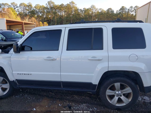 1C4NJRFB9ED713155 Jeep Patriot Latitude
