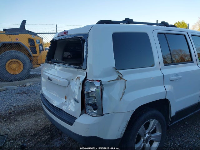 1C4NJRFB9ED713155 Jeep Patriot Latitude