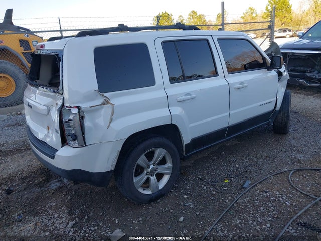 1C4NJRFB9ED713155 Jeep Patriot Latitude