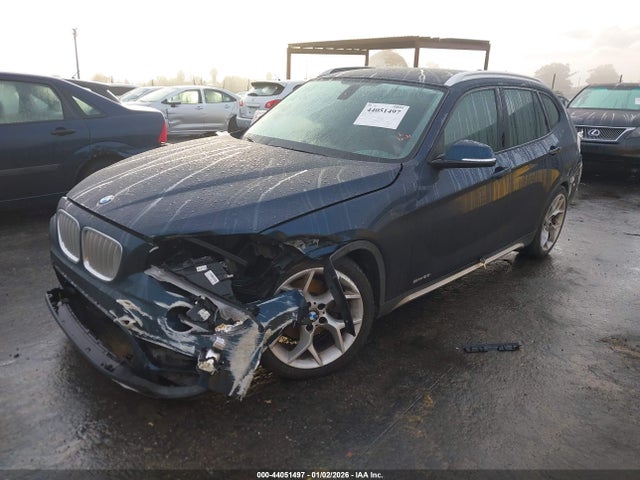 2013 BMW X1 WBAVM1C54DVW46350 Photo 1
