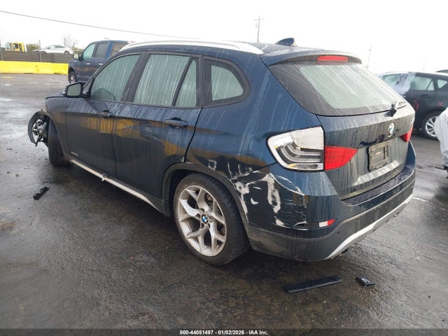 2013 BMW X1 WBAVM1C54DVW46350 Photo 2