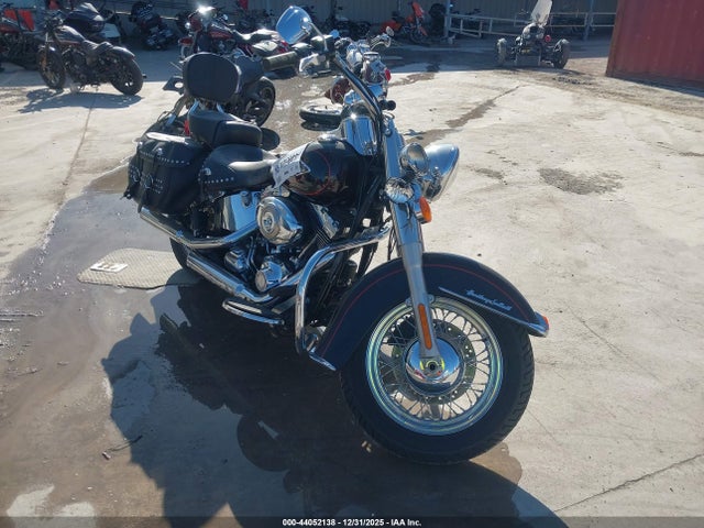 2011 HARLEY-DAVIDSON FLSTC 1HD1BW519BB016142