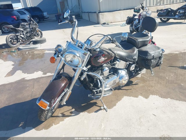 2011 HARLEY-DAVIDSON FLSTC 1HD1BW519BB016142 Photo 1