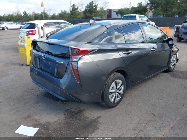 JTDKARFUXG3023329 Toyota Prius Three