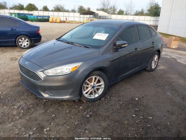 2015 FORD FOCUS 1FADP3F27FL227495 Photo 1