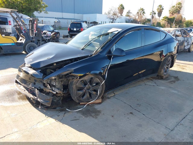 2024 TESLA MODEL Y 7SAYGAEE4RF180691 Photo 1